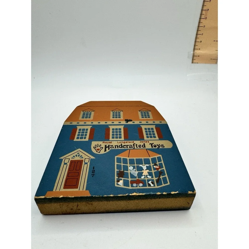 Vintage 1989 The Cat's Meow Village Series VII Handcrafted Toys Shop Wood Sitter